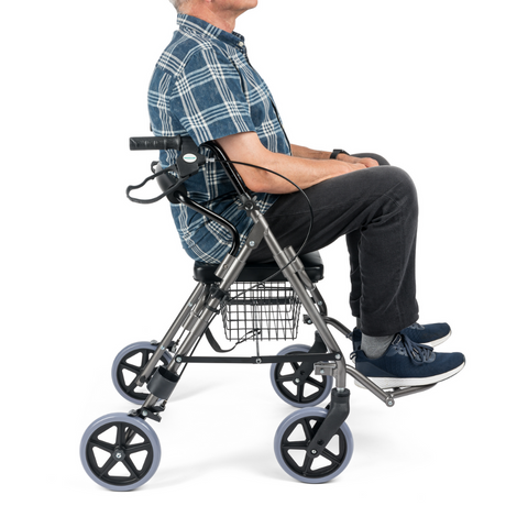 Close-up of hand brakes and height-adjustable handles on rollator.