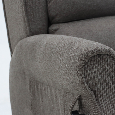 A close-up of the padded armrest on the Madison Two recliner in brown, designed to provide added comfort and support while seated.