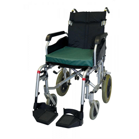 The NEST Cushion placed on a standard wheelchair, providing enhanced comfort and pressure relief for patients, with its breathable structure visible for optimal skin protection.