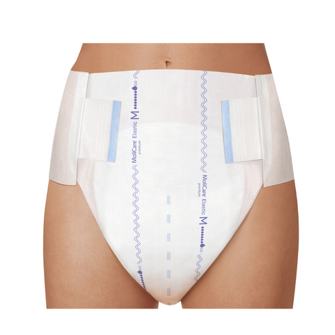 A person wearing molicare premium elastic slip demonstrating the re-seable tabs for easy putting on and taking off.