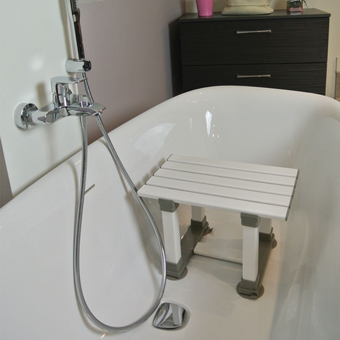 Image of the bath seat being used in a bath.