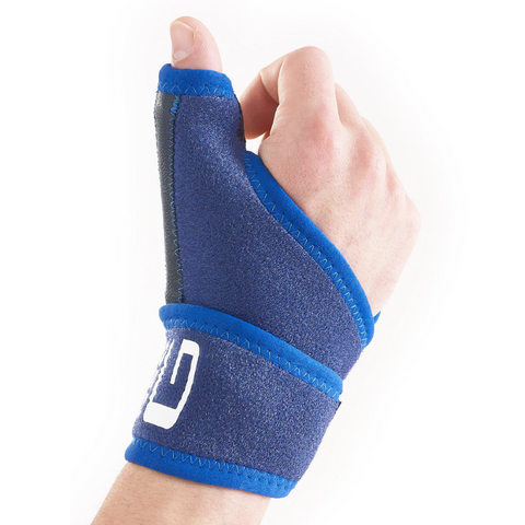 Thumb brace worn on right hand showing adjustable strap and neoprene material.
