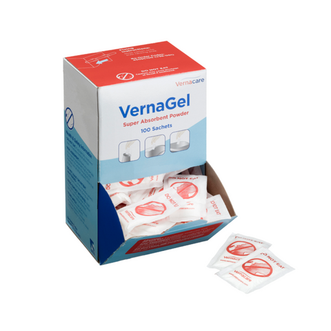 Vernagel super absorbent powder 100-sachet dispenser box with individual absorbent powder sachets visible, used for rapid liquid absorption, spill control and hygiene management in healthcare and care environments.