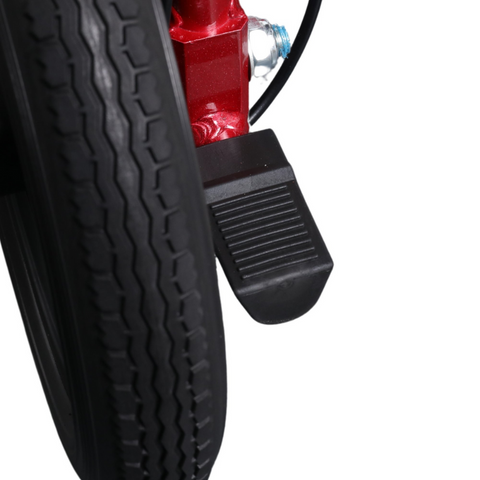 A stylish, practical i-Lite wheelchair parked outside a café, blending into everyday life with ease and elegance.