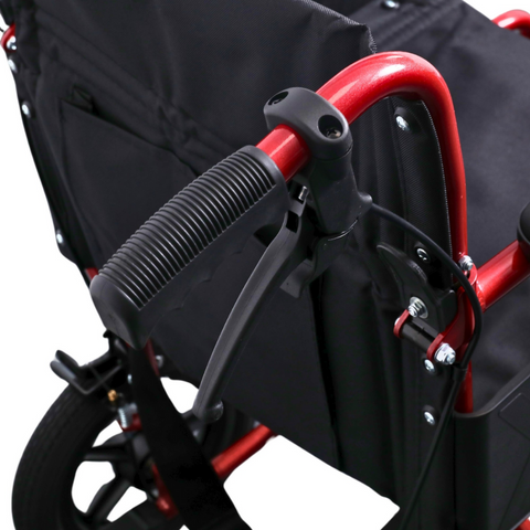 Detailed shot of the handle bars on the i-Lite wheelchair, emphasizing convenience and ease of use for the caregiver.
