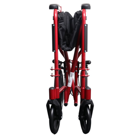 i-Lite Travel Transit Wheelchair being lifted into the trunk of a car, highlighting its portability.
