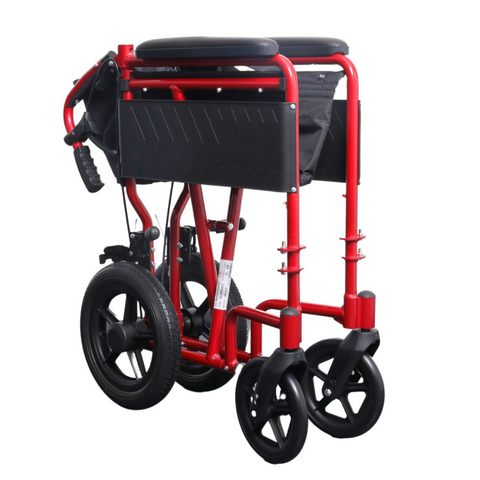i-Lite Travel Transit Wheelchair being pushed through an airport, demonstrating its travel-friendly design.